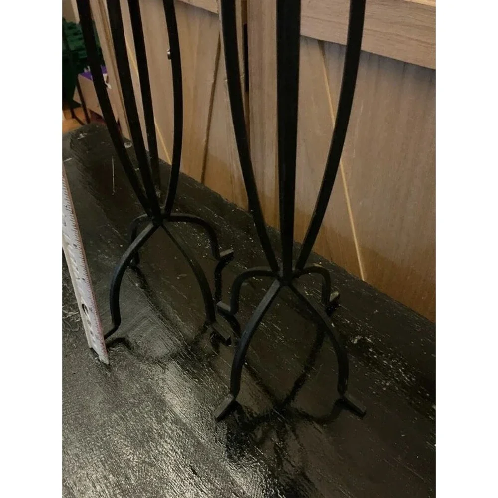 Set of black metal candle holders